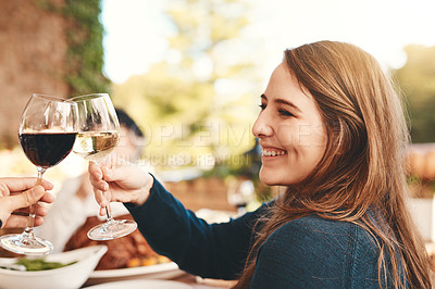 Buy stock photo Wine toast, glasses and celebration dinner party with a woman happy about holiday event. Food, happiness and christmas lunch of female cheers with alcohol drink to celebrate gratitude outdoor