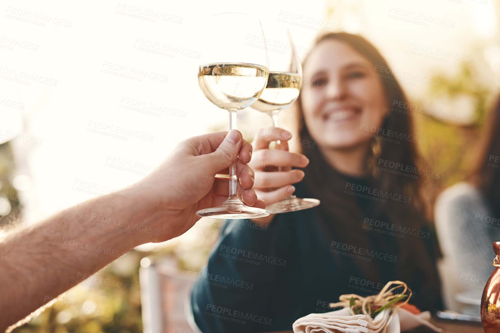 Buy stock photo Toast, glass and wine with couple hands with love, happiness and bonding at dinner together in summer. Happy celebration, woman and man with wine glass at party, restaurant or lunch in Marseille