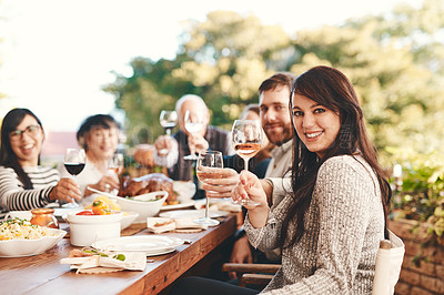 Buy stock photo Toast, wine and family at lunch in a garden during a Christmas party on the patio. Food, alcohol and portrait of friends with a cheers and eating at a table during a celebration in a backyard
