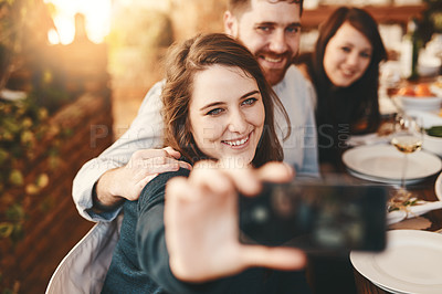 Buy stock photo Selfie, happy and friends at dinner party, lunch celebration and reunion at restaurant. Smile, people and taking photos on smartphone at social gathering with food, eating and young group together 