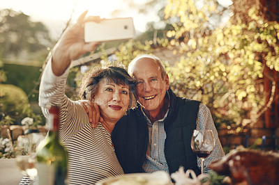 Buy stock photo Senior couple, bonding and phone selfie on vineyard holiday, wine farm vacation or retirement break on countryside estate. Smile, hug and happy elderly man and woman on mobile photography technology