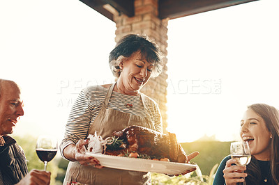 Buy stock photo Woman, roasted chicken, turkey and food outdoor at dinner table, thanksgiving cooking and family lunch, meal and social gathering together. Happy lady hosting celebration, meat plate and party feast 