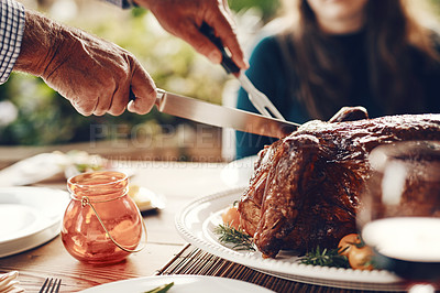 Buy stock photo Turkey, thanksgiving and chicken cut by hands at a table for a family at a home or house gathering celebration. Party, zoom and man with knife cutting food or meat to celebrate and eat with friends
