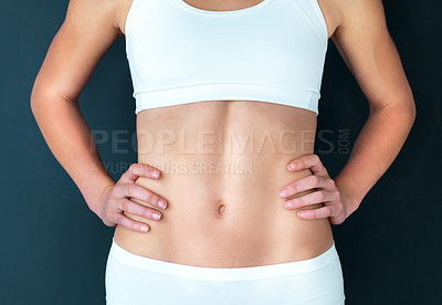 Buy stock photo Woman, body and stomach in diet, fitness or health and wellness against a studio background. Closeup of female person or model tummy with hands on hips for self care or natural nutrition on mockup