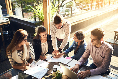 Buy stock photo Business, group and typing in meeting, cafe and ideas for project, graph and laptop on table. Planning, SEO and teamwork of people with stats, creative and discussion of information and paperwork