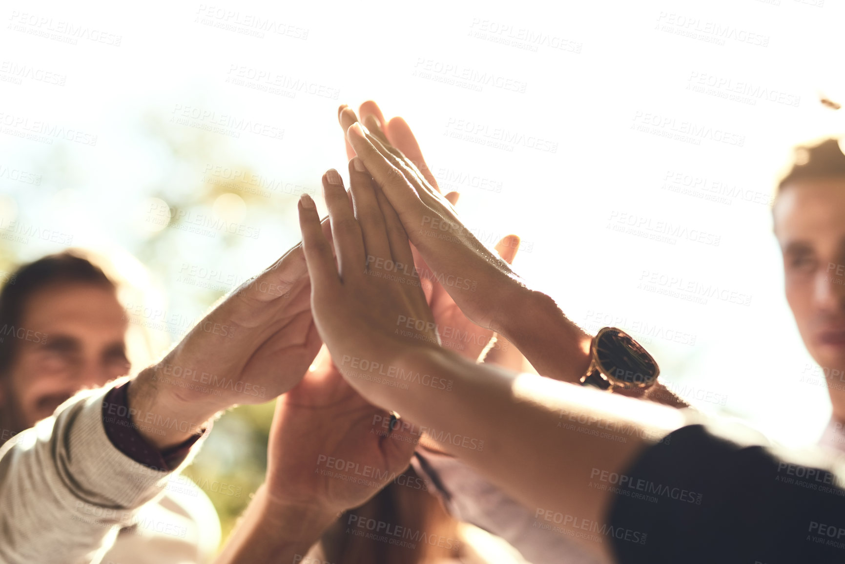 Buy stock photo Business people, hands and high five for teamwork, winning or success in unity or collaboration outdoors. Group touching hand in agreement, meeting or team building for win, support or goals together