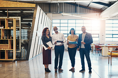 Buy stock photo Portrait of a group of designers standing together in an office