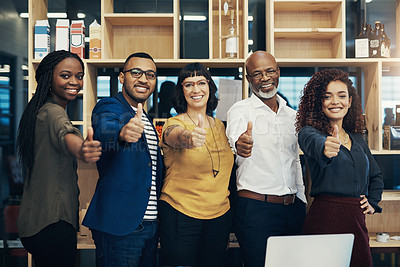 Buy stock photo Portrait of a group of creative businesspeople showing thumbs up