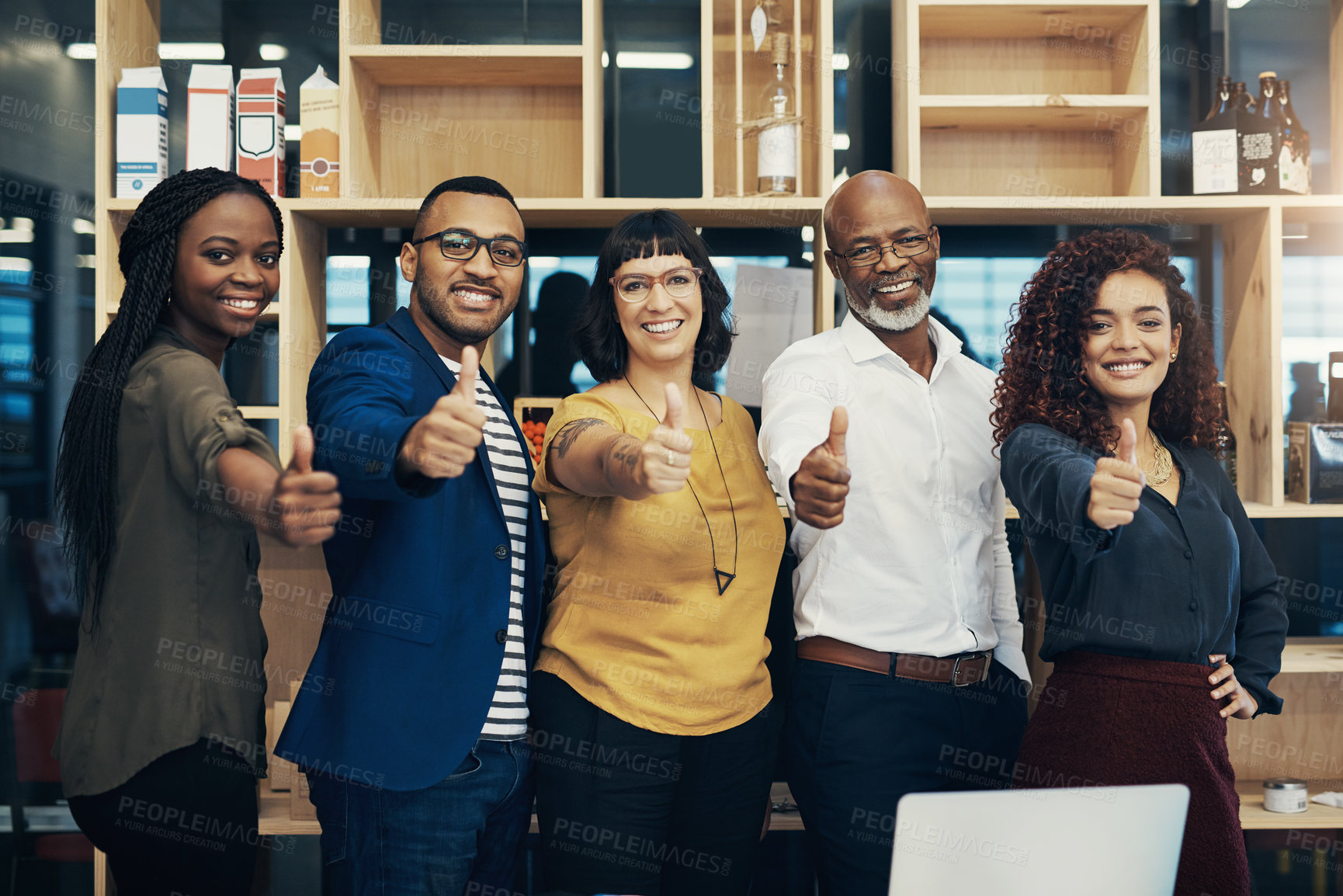 Buy stock photo Creative business people, thumbs up and smile in office portrait for agreement, approval and app design with collaboration. Employees, diversity and project meeting, teamwork or thank you for startup
