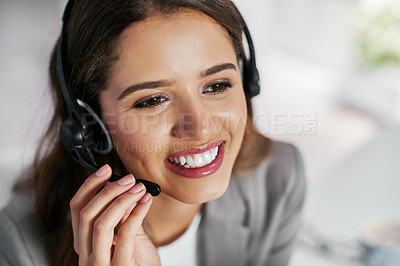 Buy stock photo Cropped shot of a young female call center agent working in an office