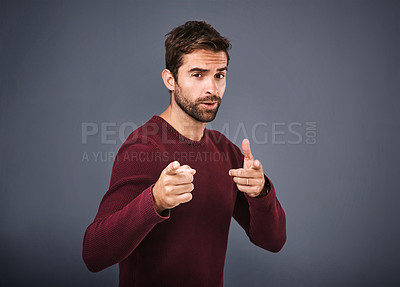 Buy stock photo Studio, pointing and portrait of man, proud and choice for fashion, gesture and jersey for winter. Black background, mockup and banner for person with cardigan, cool and clothes with organic cotton