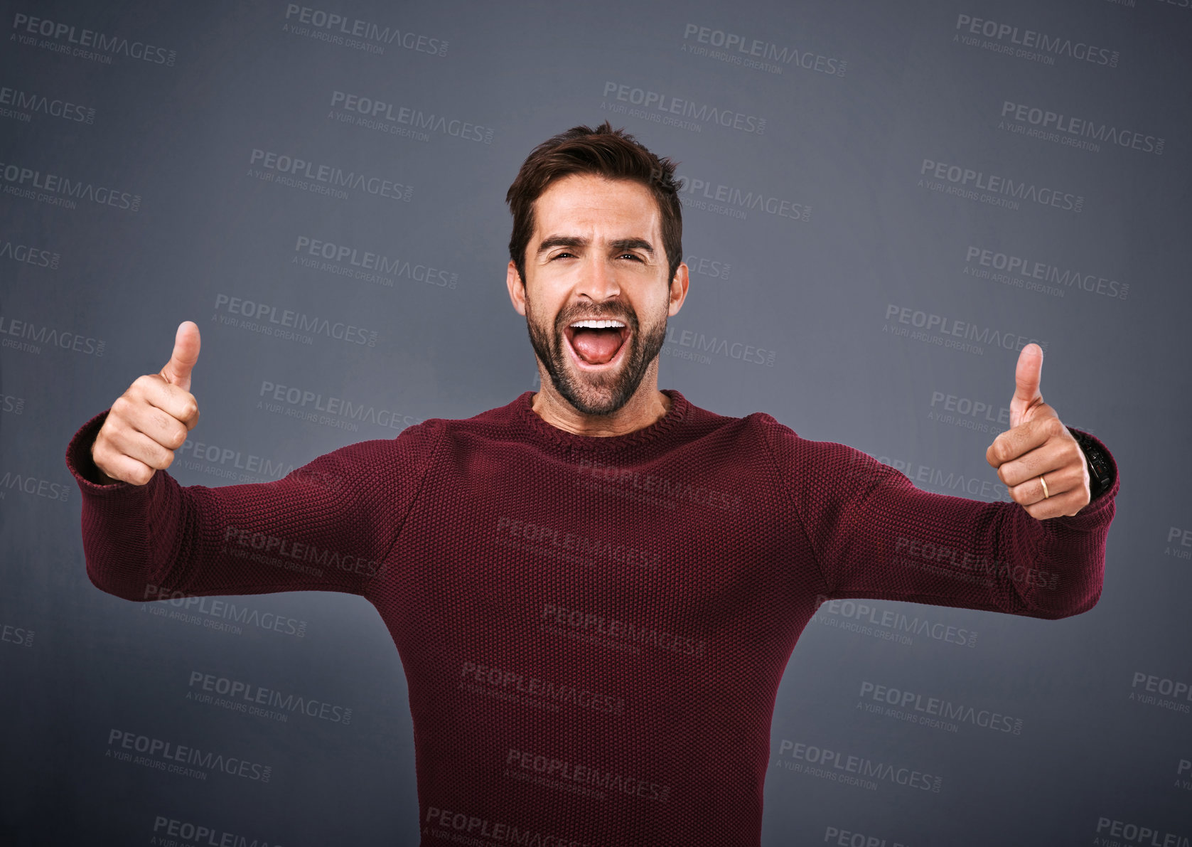 Buy stock photo Man, success and thumbs up in studio for winning, support and like or yes for achievement. Portrait of excited person shouting, cheering and motivation with good luck and voting on gray background