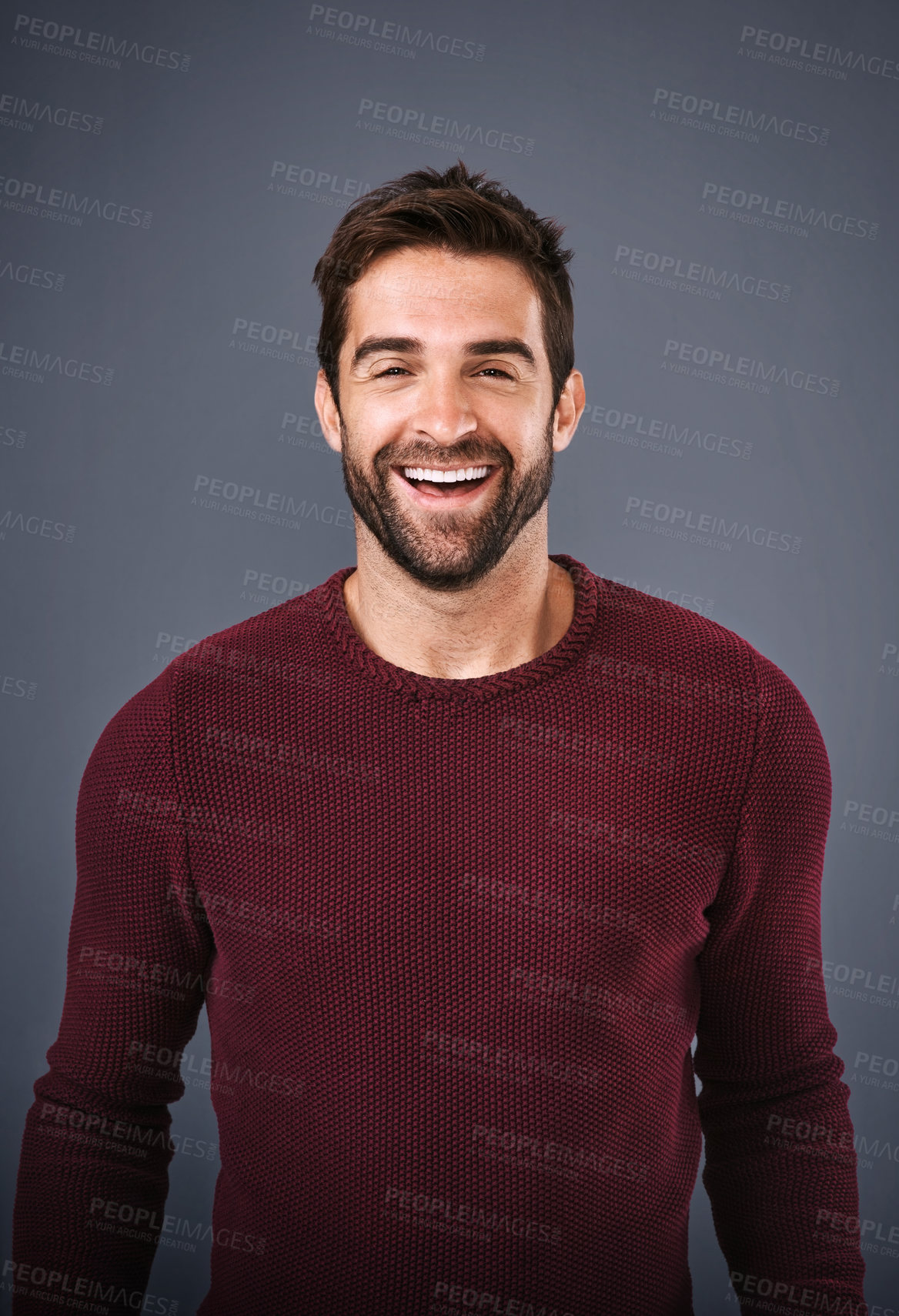 Buy stock photo Studio, confidence and man with smile, portrait and fashion of sweater, organic cotton and excited. Grey background, face and happiness of person, proud and calm with jersey, joy and trendy style
