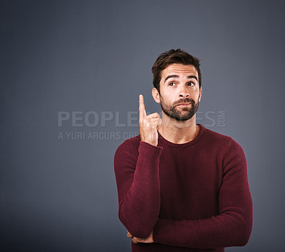 Buy stock photo Choice, thinking and man with ideas, decision and problem solving on grey studio background. Person, model and guy with wonder, why and thoughts with questions, inspiration and planning with solution