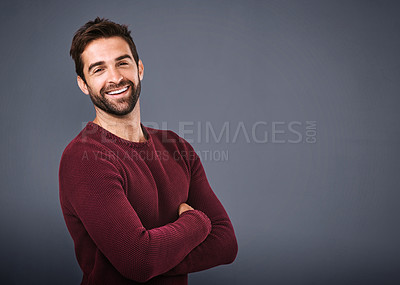 Buy stock photo Studio, happy and jersey for man, fashion and confidence in mockup space, pride and cardigan in winter. Gray background, portrait and person in Miami, smile or comfortable in clothes, joy and sweater