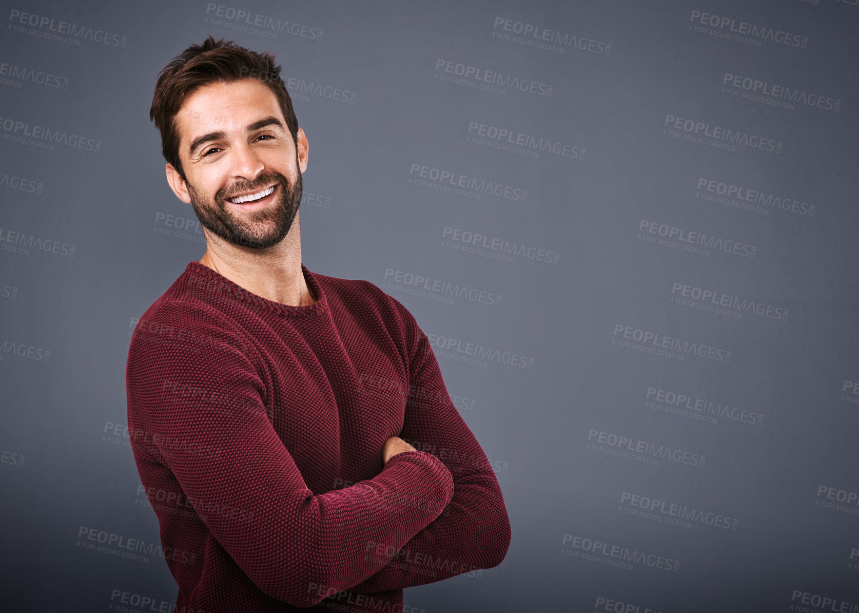 Buy stock photo Studio, happy and jersey for man, fashion and confidence in mockup space, pride and cardigan in winter. Gray background, portrait and person in Miami, smile or comfortable in clothes, joy and sweater