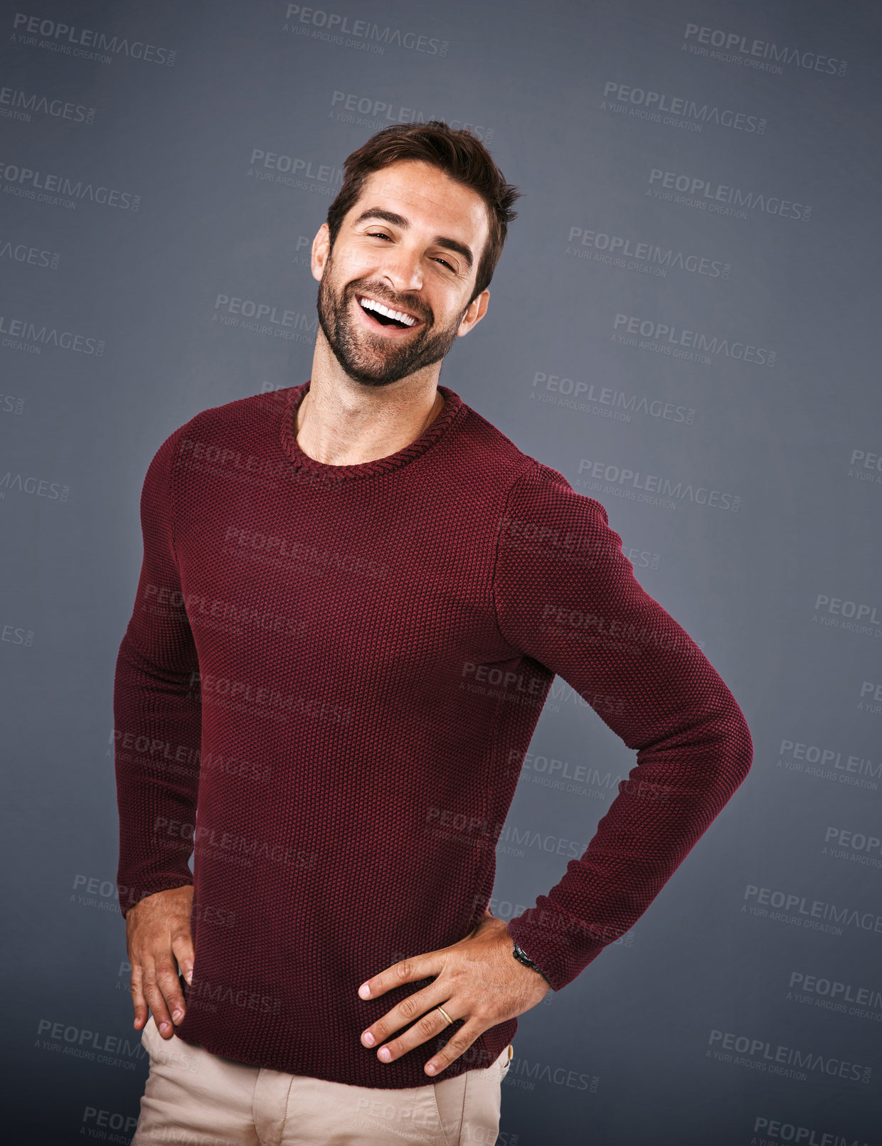 Buy stock photo Studio, portrait and laughing of man, sweater and confidence in mockup space, pride and cardigan in winter. Gray background, funny and person in Miami, happy or comfortable in clothes, joy and jersey