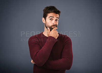 Buy stock photo Doubt, thinking and portrait of man with unsure, uncertain and thoughtful on gray background. Wondering, mockup space and face of male person confused for decision, choice and question in studio