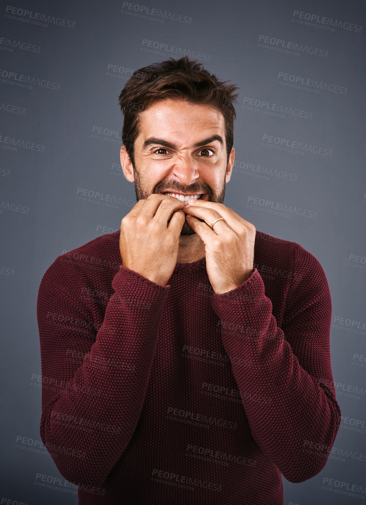 Buy stock photo Portrait, scared and man with biting of nails, studio and anxiety with stress, afraid and fear. Gray background, mental health and person with terror for nightmare of fail in test of college in USA