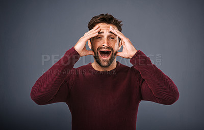 Buy stock photo Studio, shock and man with frustration, screaming and terror of news, scared and secret of phobia. Gray background, portrait and shouting of person, stress and surprise of gossip, anxiety and fear