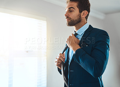 Buy stock photo Man, suit and morning for getting ready in home, business fashion and preparation for job interview. Male person, bedroom and corporate style for recruitment opportunity, confident and fixing tie