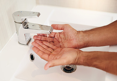 Buy stock photo Tap, water and person cleaning hands for skincare, personal grooming and safety of bacteria, healthy and dermatology. Closeup, palm and washing hand at basin in bathroom for hygiene routine at home