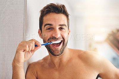 Buy stock photo Portrait, toothbrush and happy man brushing teeth in morning for dental wellness, healthy habit and gums. Face of guy cleaning mouth for fresh breath, oral hygiene and routine in bathroom at home