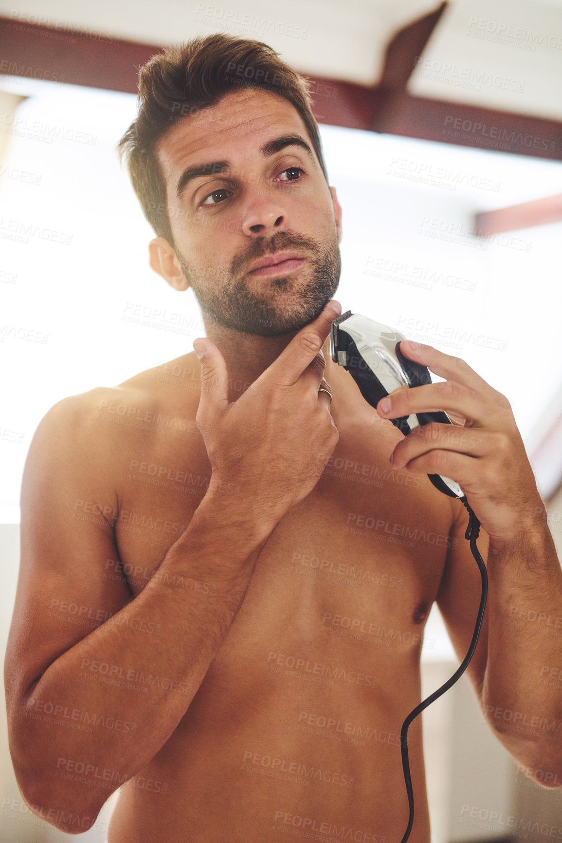 Buy stock photo Man, shaving and face with electrical razor for hair removal, aesthetic skincare or beauty cleaning at home. Shirtless guy shave beard with blade, trimmer and cosmetic tool in bathroom in the morning