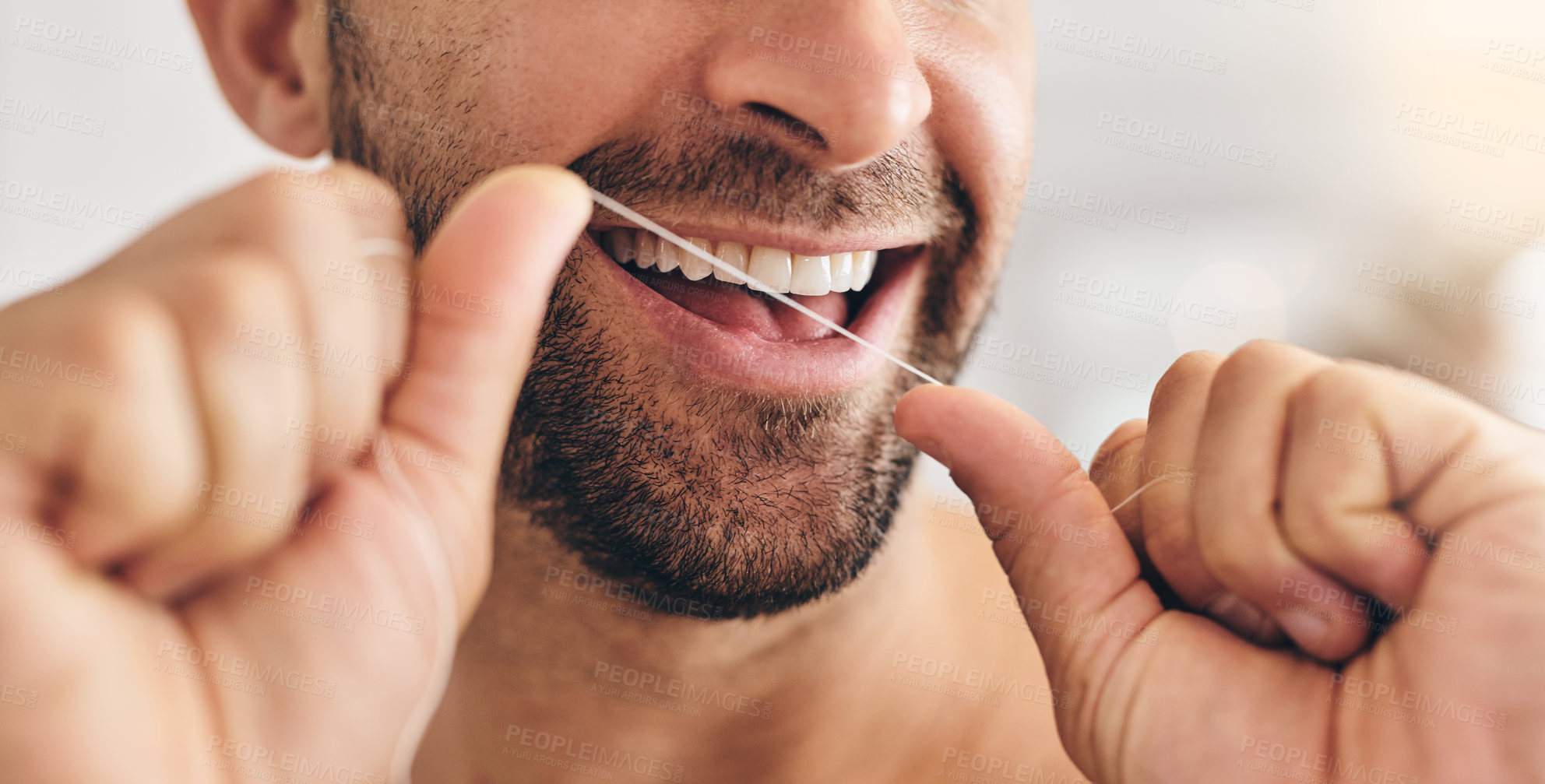 Buy stock photo Closeup, face and man flossing teeth at home for healthy dental wellness, plaque and gingivitis. Happy guy, oral thread or cleaning mouth for fresh breath, tooth hygiene and habit to care for smile