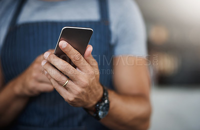 Buy stock photo Cafe, waiter and hands of man with phone for online order, communication and restaurant app update. Small business, worker and technology at coffee shop for web, sales and digital hospitality service