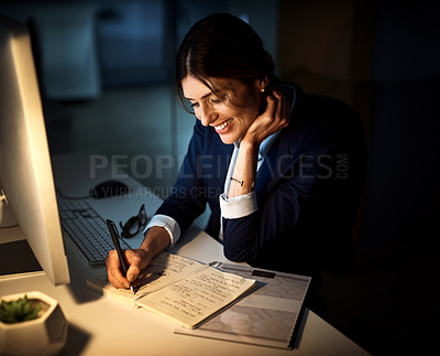 Buy stock photo Book, smile and businesswoman or writing at night or planning and pc in an office. Corporate, dark and female worker or project manager in the evening or company note and dedicated on computer