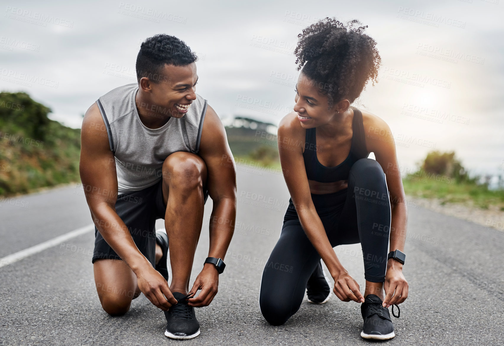 Buy stock photo Nature, exercise and couple tie laces in road with running workout for race or marathon training. Sports, outdoor and shoes for track and field athletes preparing for cardio fitness on asphalt.