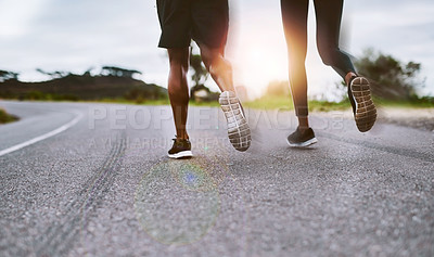 Buy stock photo Closeup shot of a sporty couple exercising together outdoors