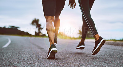 Buy stock photo Closeup shot of a sporty couple exercising together outdoors