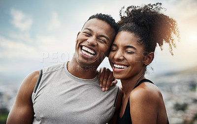 Buy stock photo Portrait of a sporty young couple exercising together outdoors