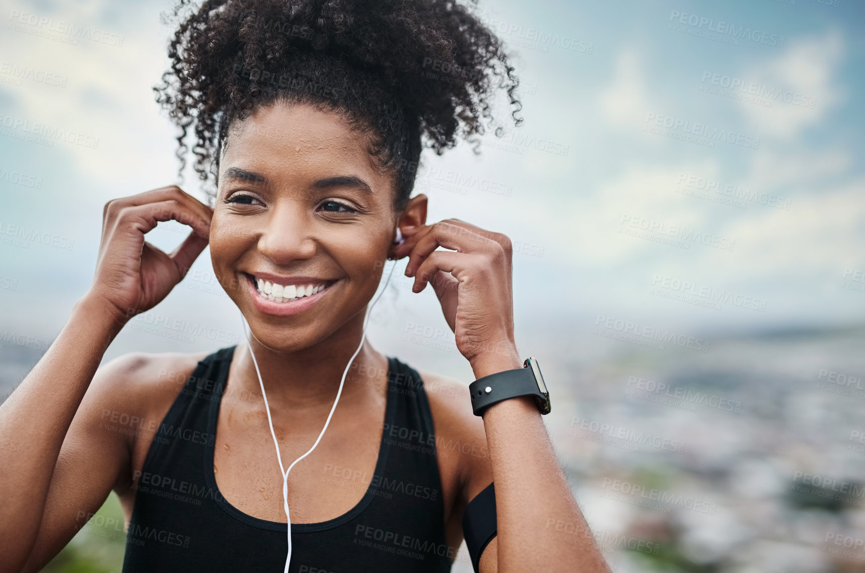 Buy stock photo Music, fitness and happy woman runner outdoors for wellness, training and cardio. Radio, smile and african female runner with podcast for workout motivation, exercise and sports, routine and run