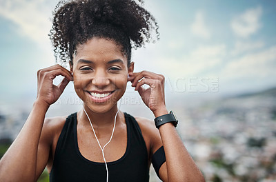 Buy stock photo Fitness, earphones and portrait of woman outdoor with music for training, running or cardio. Radio, smile and face of African female runner with podcast for workout motivation, exercise and sport run
