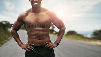 Buy stock photo Cropped shot of an unrecognizable young sportsman standing with his hands on his hips outside