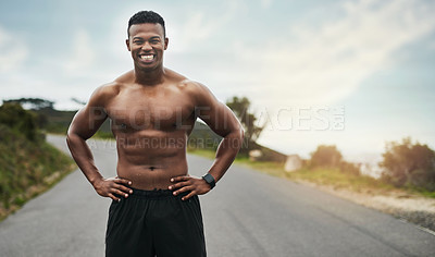 Buy stock photo Cropped portrait of a handsome young sportsman standing with his hands on his hips outside