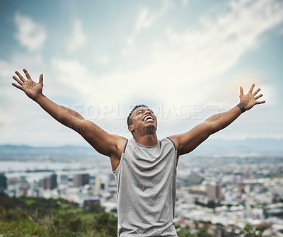 Buy stock photo Black man, runner and raised hands on mountain for celebration, excited and scream for achievement in city. African person, space and fitness with exercise goal, challenge or happy for cardio on hill
