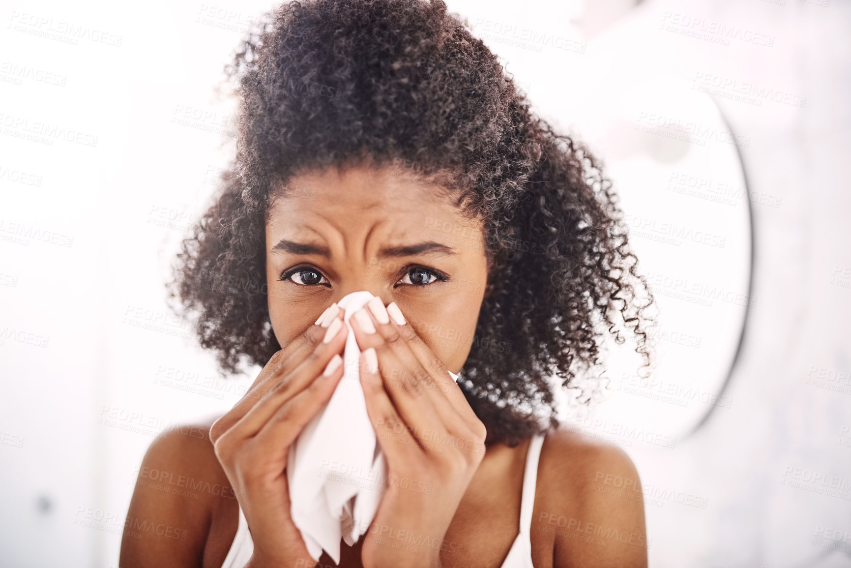 Buy stock photo Sick woman, portrait or blowing nose with tissue for sinus, allergy or virus in bathroom at home. Young, female person or flu with cold or bacteria infection for influenza, sneeze or covid at house