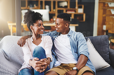 Buy stock photo House, talk and black couple on sofa, love and relax with happiness, bonding together and calm. Apartment, people or man with woman, relationship and marriage with joy, cheerful or speaking in lounge