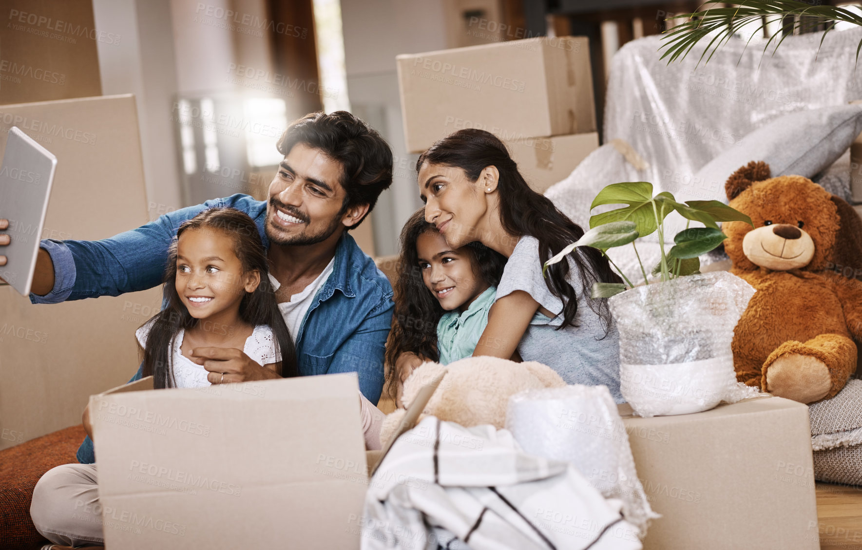 Buy stock photo Happy family, picture or box with selfie for moving in new home, memory or moment on floor. Father, mother and young daughter, children or kids with smile for photography,  or property investment