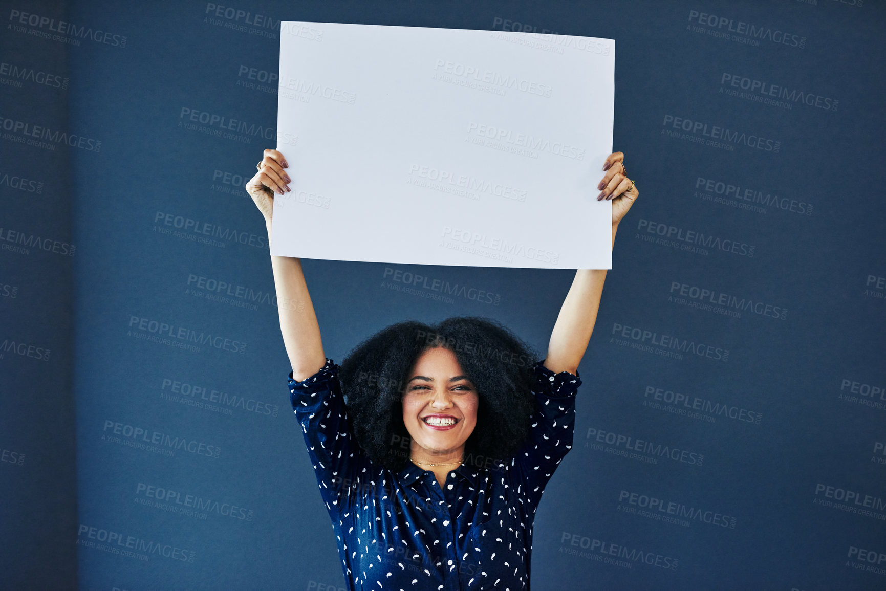 Buy stock photo Paper, mockup and portrait of happy woman in studio with banner for news, social media or advertising on blue background. Space, billboard and female smile with poster, sticker and branding promotion