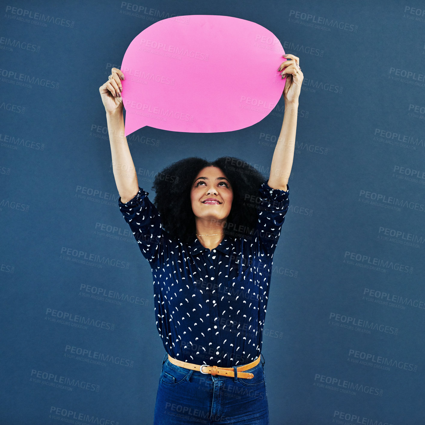 Buy stock photo Speech bubble, mockup and woman in studio with banner for news, social media or advertising on blue background. Space, billboard and female person with paper, poster or branding, launch or promotion
