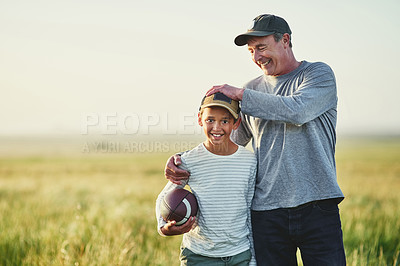 Buy stock photo Father, kid portrait and rugby play in countryside field for bonding and fun in nature. Mockup, dad and young child together with happiness and smile ready for sports and kids game outdoor on farm
