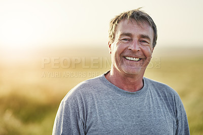 Buy stock photo Portrait of a mature man standing outdoors