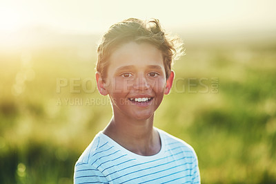Buy stock photo Portrait of a little boy standing outdoors