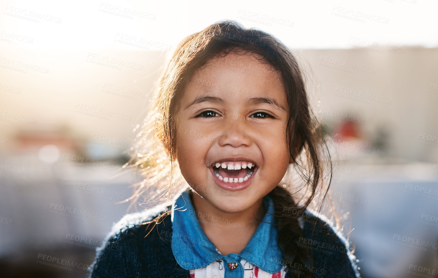 Buy stock photo Happy kid, face and girl laughing in living room, playing and having fun in her home. Child, development and portrait of Mexican female toddler with funny, joke or reaction to crazy comedy in a house