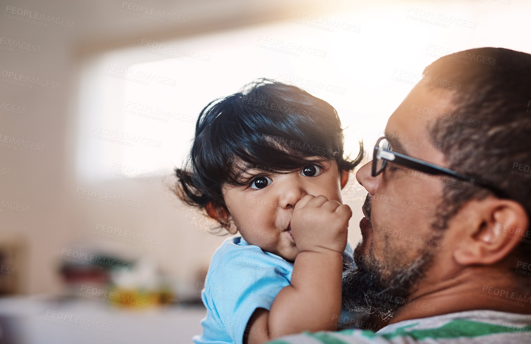 Buy stock photo Man, family and baby embrace at house with bonding, love and trust in safety growth on weekend. Boy, father and hug for security, care and teething support, attention and child development